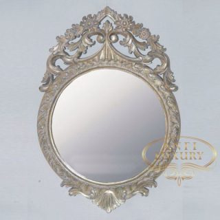 camille gold carved mirror